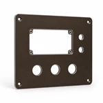 CNC-cut anodized aluminum panel showing four press-fit nuts, chamfered openings and countersunk mounting holes.