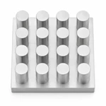 Close view of a machined aluminum pin-fin heat sink with sixteen equal cooling pins.