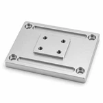 CNC-machined aluminum base plate showing uniform milling texture, threaded holes, counterbores and chamfers.